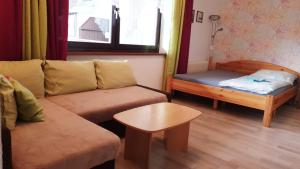 Postel nebo postele na pokoji v ubytování Apartments Helga