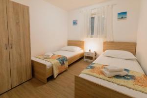 Postel nebo postele na pokoji v ubytování House Moro