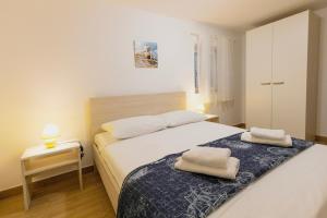 Postel nebo postele na pokoji v ubytování House Moro