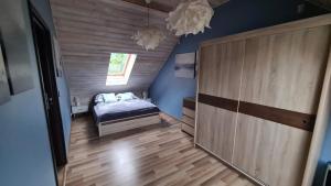 Posteľ alebo postele v izbe v ubytovaní Sasinko