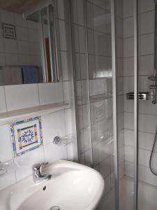 Koupelna v ubytování Apartment Andrea - Chiemgau Karte