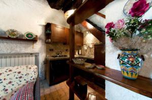 A kitchen or kitchenette at Casa Graziella al Borgo