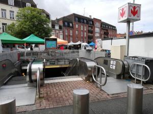 a skate park with a ramp in a city at Duplex Savane, Lille in Lille