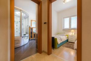 Postel nebo postele na pokoji v ubytování Apartment Igor 3 ****