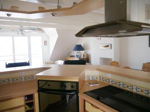 Een keuken of kitchenette bij Une Vue Exceptionnelle