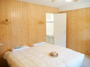 Een bed of bedden in een kamer bij Une Vue Exceptionnelle