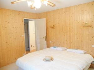 Een bed of bedden in een kamer bij Une Vue Exceptionnelle