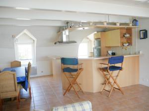 Een keuken of kitchenette bij Une Vue Exceptionnelle