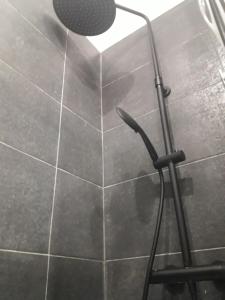 a microphone sitting on top of a tiled wall at ALEJA PARK CZĘSTOCHOWA in Częstochowa +29 photos