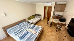 Posteľ alebo postele v izbe v ubytovaní Dalma Apartment