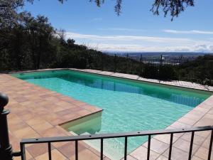 a swimming pool with a view of the ocean at Preciosa Villa de Campo / Wonderful Country Villa in San Agustín de Guadalix