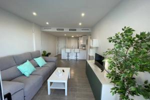 Kuchyň nebo kuchyňský kout v ubytování Amazing Duna Beach Seafront Apartament