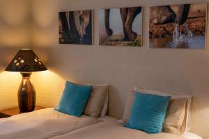 Кровать или кровати в номере Impisi Accommodation
