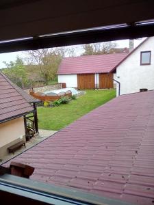 a view from a window of a roof at Hostinec u Janatů s ubytováním in Čestín