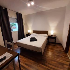 Posteľ alebo postele v izbe v ubytovaní Habitaciones La MAR