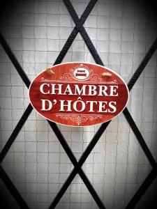 a sign that says charma dhles on a fence at B&B chez Annie in Saint-Martin-de-Gurçon