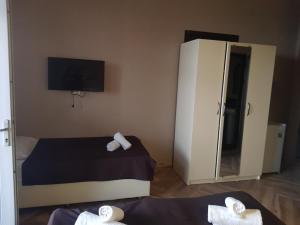 Letto o letti in una camera di MIDIA Guest House