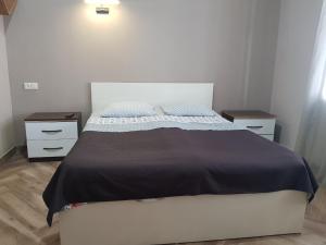Letto o letti in una camera di MIDIA Guest House