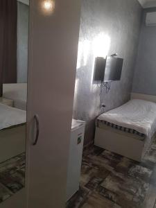 Letto o letti in una camera di MIDIA Guest House