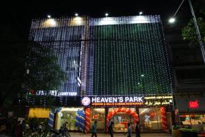 a lit up building with christmas lights on it at century courtyard in Chennai