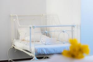 Postel nebo postele na pokoji v ubytování Petala House