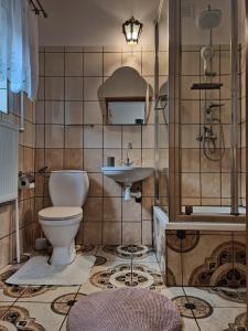Kúpeľňa v ubytovaní Bora Zdrój - apartament