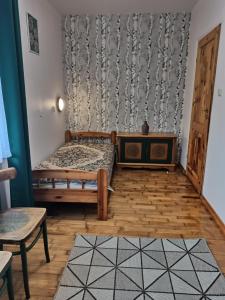 Posteľ alebo postele v izbe v ubytovaní Bora Zdrój - apartament