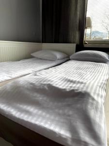Posteľ alebo postele v izbe v ubytovaní EXPO KRUPÓWKI 60 APARTMENT
