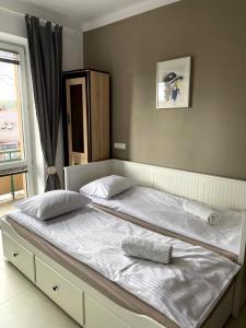 Posteľ alebo postele v izbe v ubytovaní EXPO KRUPÓWKI 60 APARTMENT
