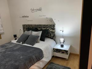 A bed or beds in a room at A&M Burela Costa