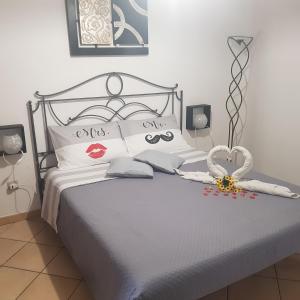Кровать или кровати в номере La Rotonda sul mare