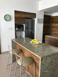 Kuchyň nebo kuchyňský kout v ubytování Resort Playa Azul Departamentos frente al mar