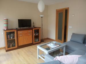 Кът за сядане в Apartamento en Nueva de Llanes