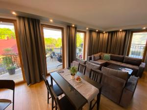 Posedenie v ubytovaní Apartamenty Pod Jesionem