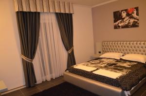 Postel nebo postele na pokoji v ubytování Hotel Mustang