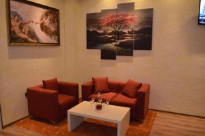 Posezení v ubytování Hotel Mustang