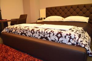 Postel nebo postele na pokoji v ubytování Hotel Mustang