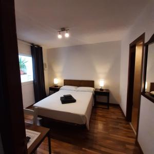 Posteľ alebo postele v izbe v ubytovaní Habitaciones La MAR