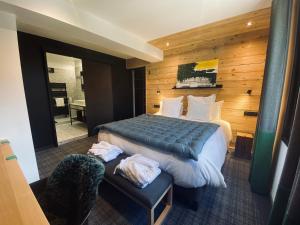 Postel nebo postele na pokoji v ubytování Hôtel 16 | 150 Montagne & Spa Nuxe