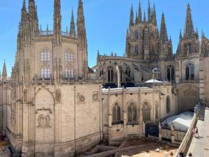 a large cathedral with turrets and domes at Contemplando la Catedral by Exclusive Burgos Apartments in Burgos
