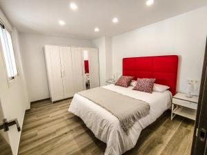 Posteľ alebo postele v izbe v ubytovaní Apartamentos La Libertad 1 + 21 fotografií
