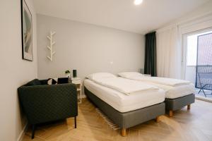 Rooms at Zajčeva 34客房内的一张或多张床位