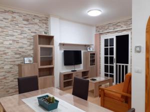 TV a/nebo společenská místnost v ubytování Casa Herrera