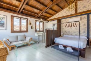 Posteľ alebo postele v izbe v ubytovaní Apartamentos Real Suites Realejo