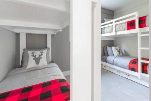 Двох'ярусне ліжко або двоярусні ліжка в номері Le Grand Lodge - Locations du Sommet