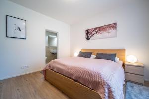 Postel nebo postele na pokoji v ubytování Apartmán Lipnoport