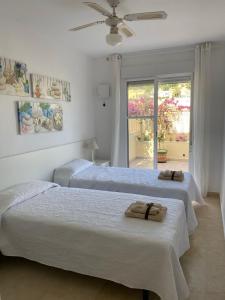 Ліжко або ліжка в номері Calpe - 2 bedroom 2 bathroom townhouse - Residencial Cala Manzanera