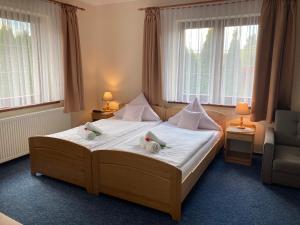 Postel nebo postele na pokoji v ubytování Hotel Habenda + 54 fotografií