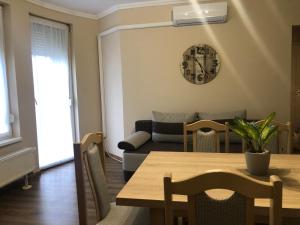 Posezení v ubytování Alina apartmanok