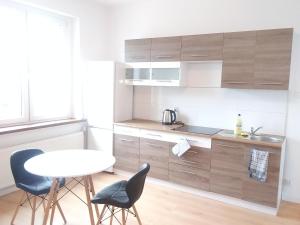 Kuchyňa alebo kuchynka v ubytovaní Marshal Foch Apartment